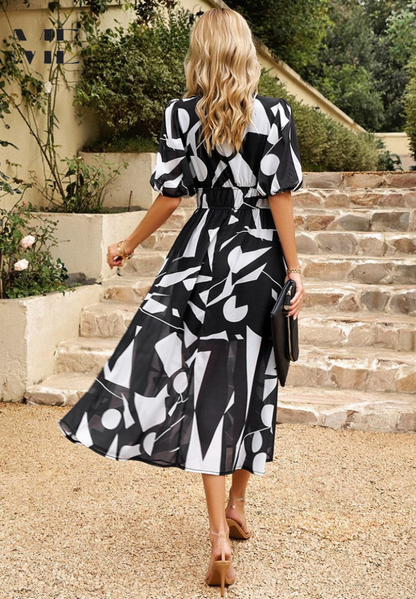 Catarina | Robe midi florale à manches bouffantes - Image 10