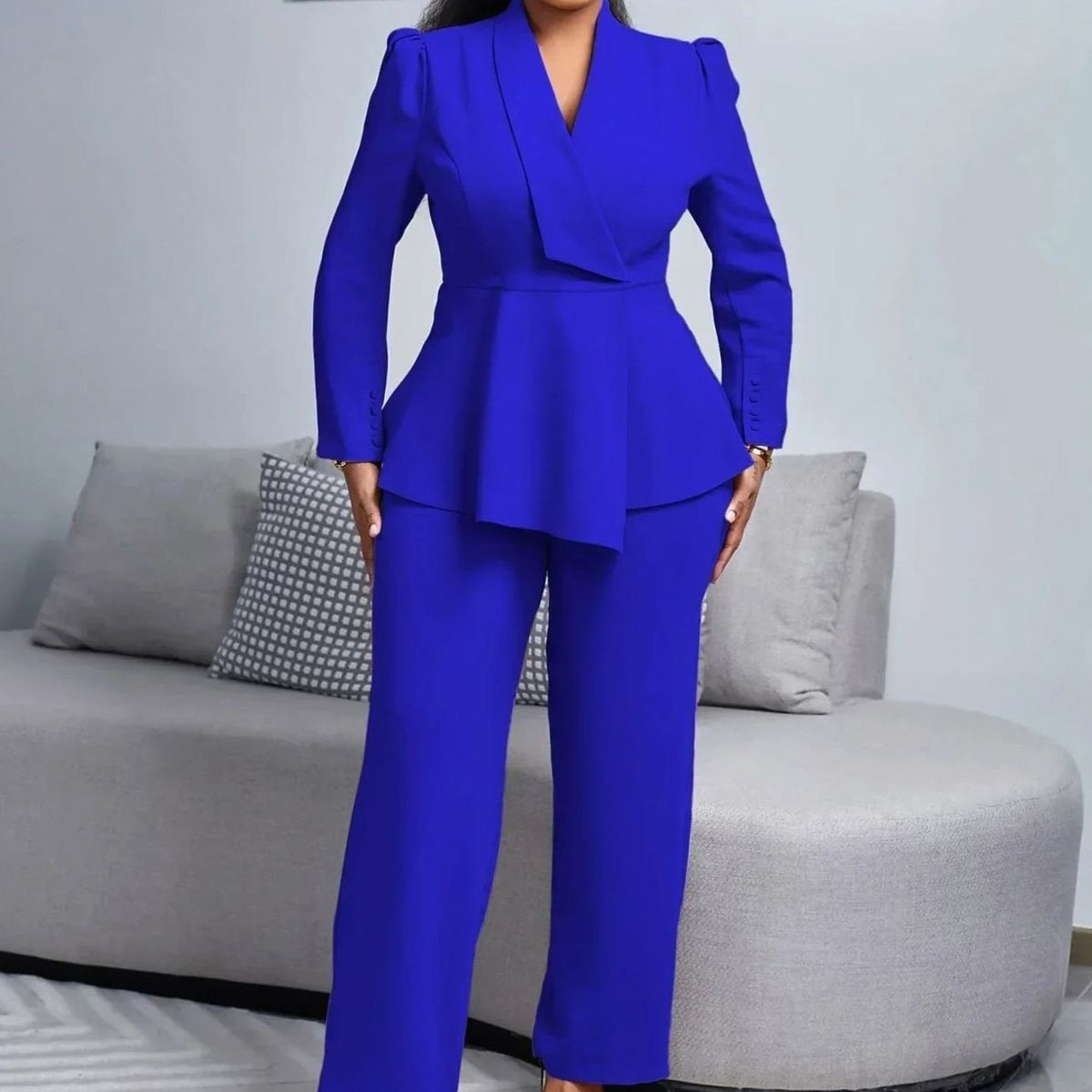 Buksesæt til damer med peplum-blazer og vide ben