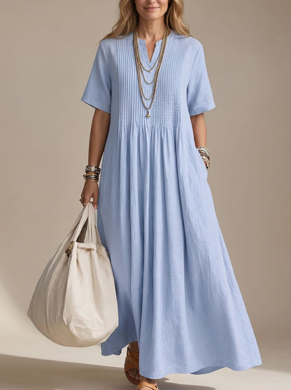 Flydende maxikjole til damer med V-udskæring og læg