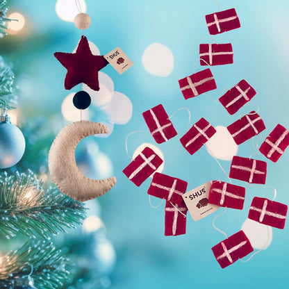 Håndlavet julepynt med måne, stjerne og planeter i 100% ren uld