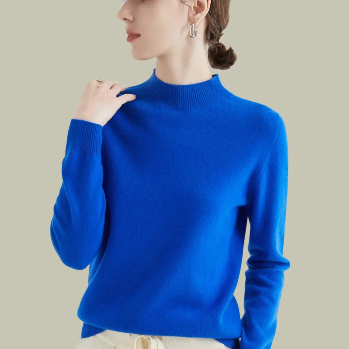 Langærmet striktrøje i merinould til damer med mock-neck