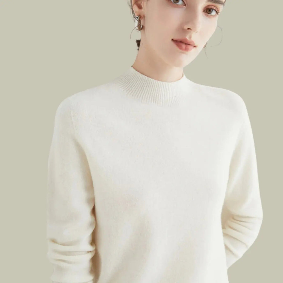 Langærmet striktrøje i merinould til damer med mock-neck