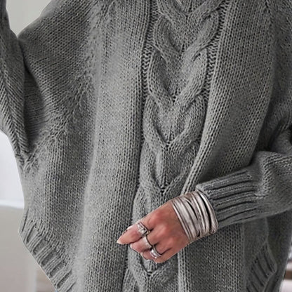 Oversized kabelstrikket sweater med høj hals til damer