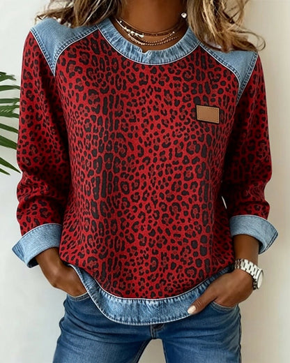 Sweater til damer med leopardprint og denim-patchwork